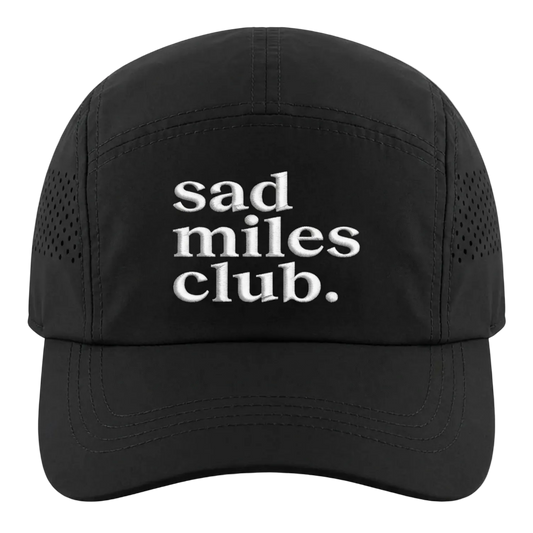 Black cap with 'sad miles club.' text on a white background
