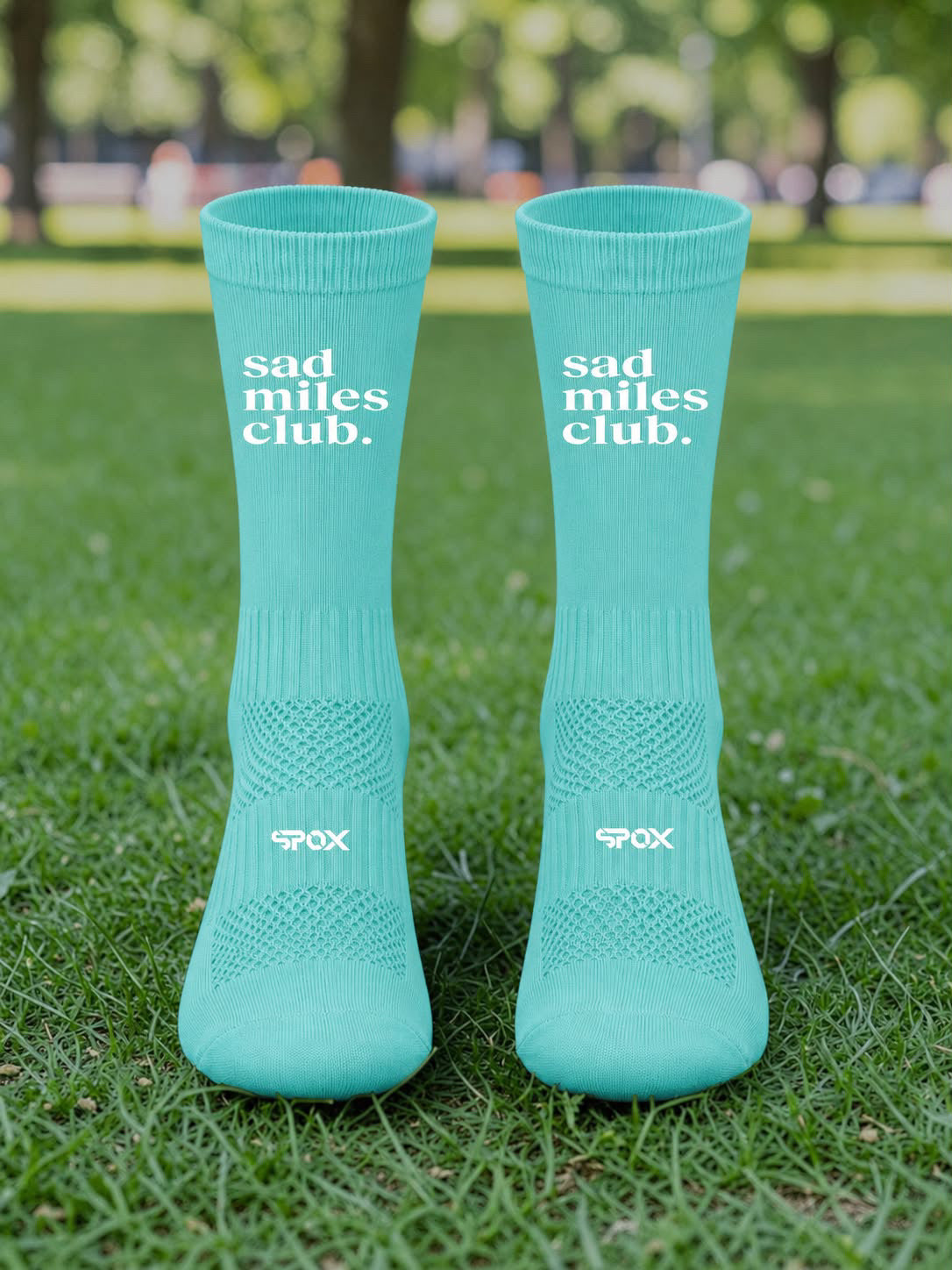 sad miles club. runners wearing the No One Gets Left Behind collection