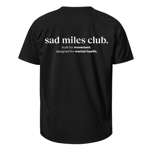 Black t-shirt with 'sad miles club' text on a white background