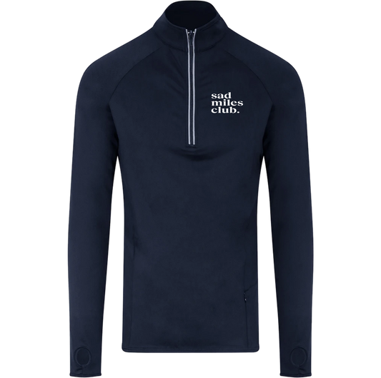 Navy long-sleeve athletic top with 'sad miles club' text on a white background