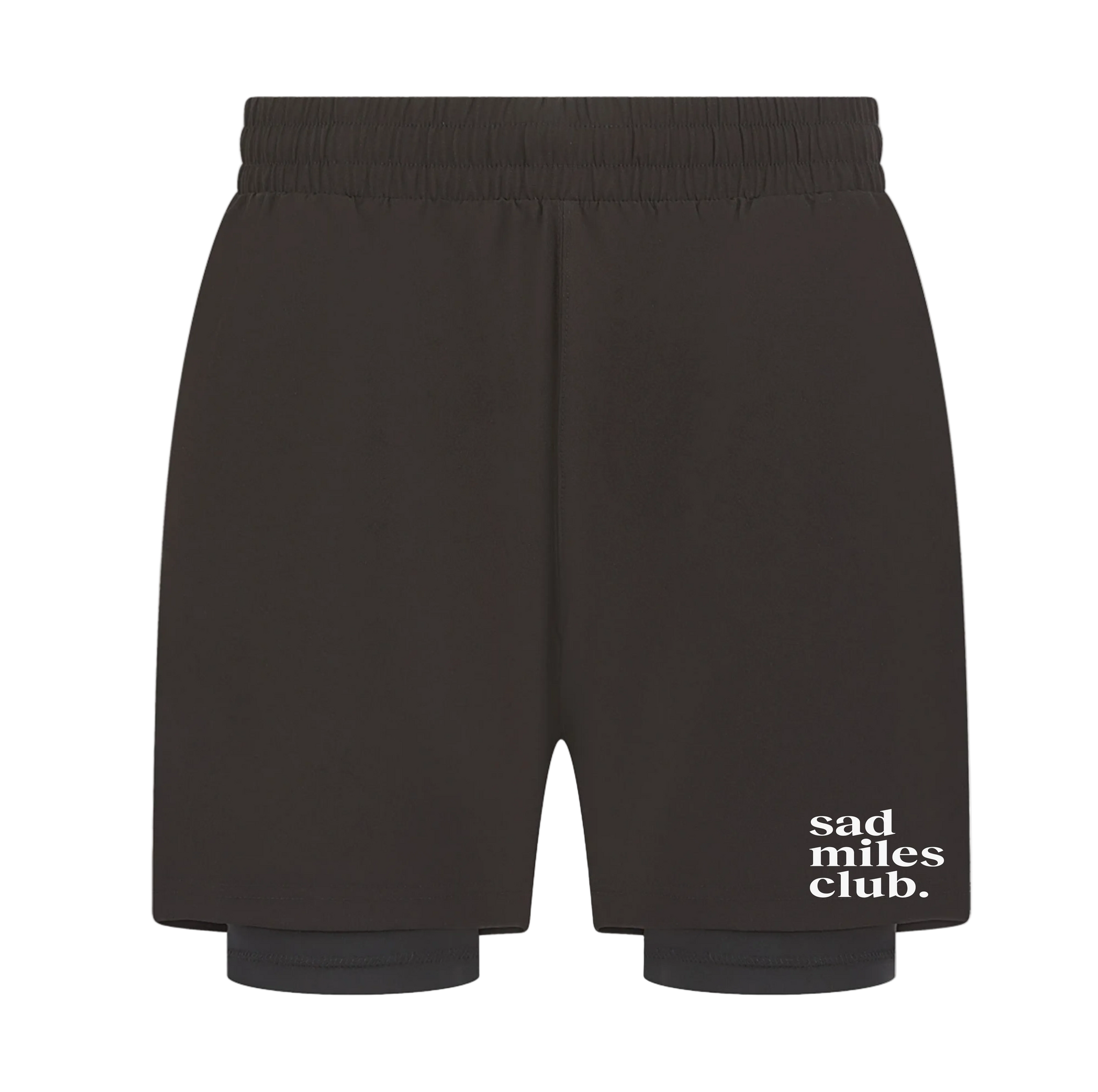 Black shorts with 'sad miles club' text on a white background