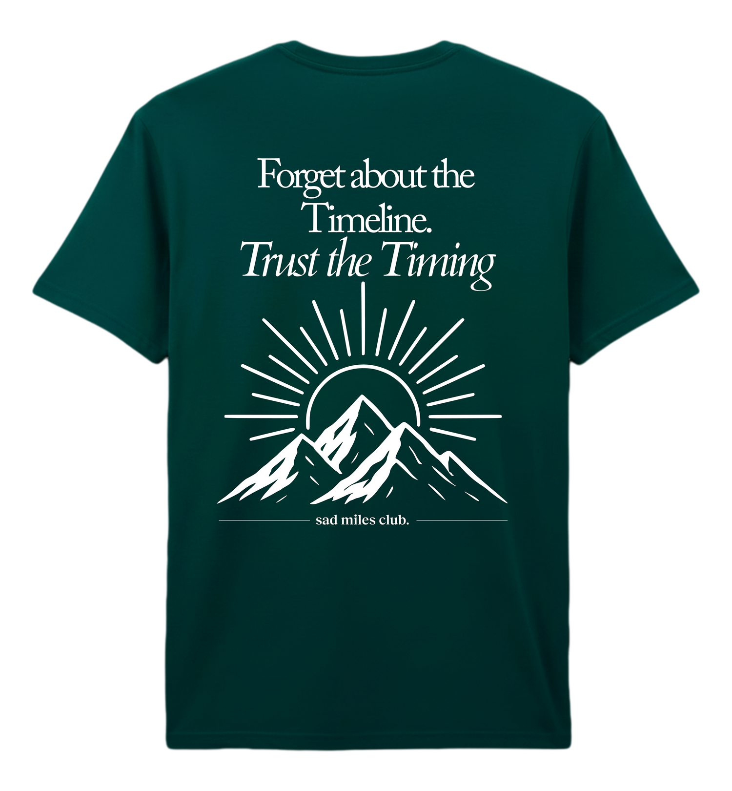 Green t-shirt with motivational quote and mountain design on a white background