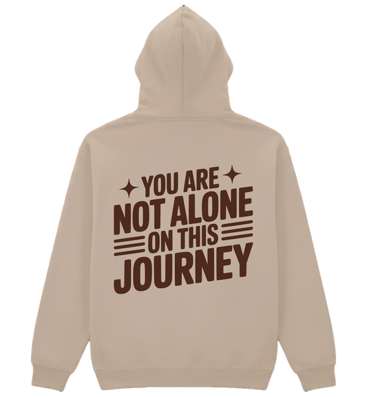 Beige hoodie with motivational text on the back on a white background