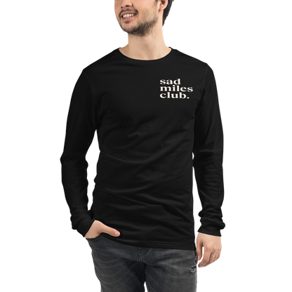 Person wearing a black long-sleeve shirt with 'sad miles club' text on a white background